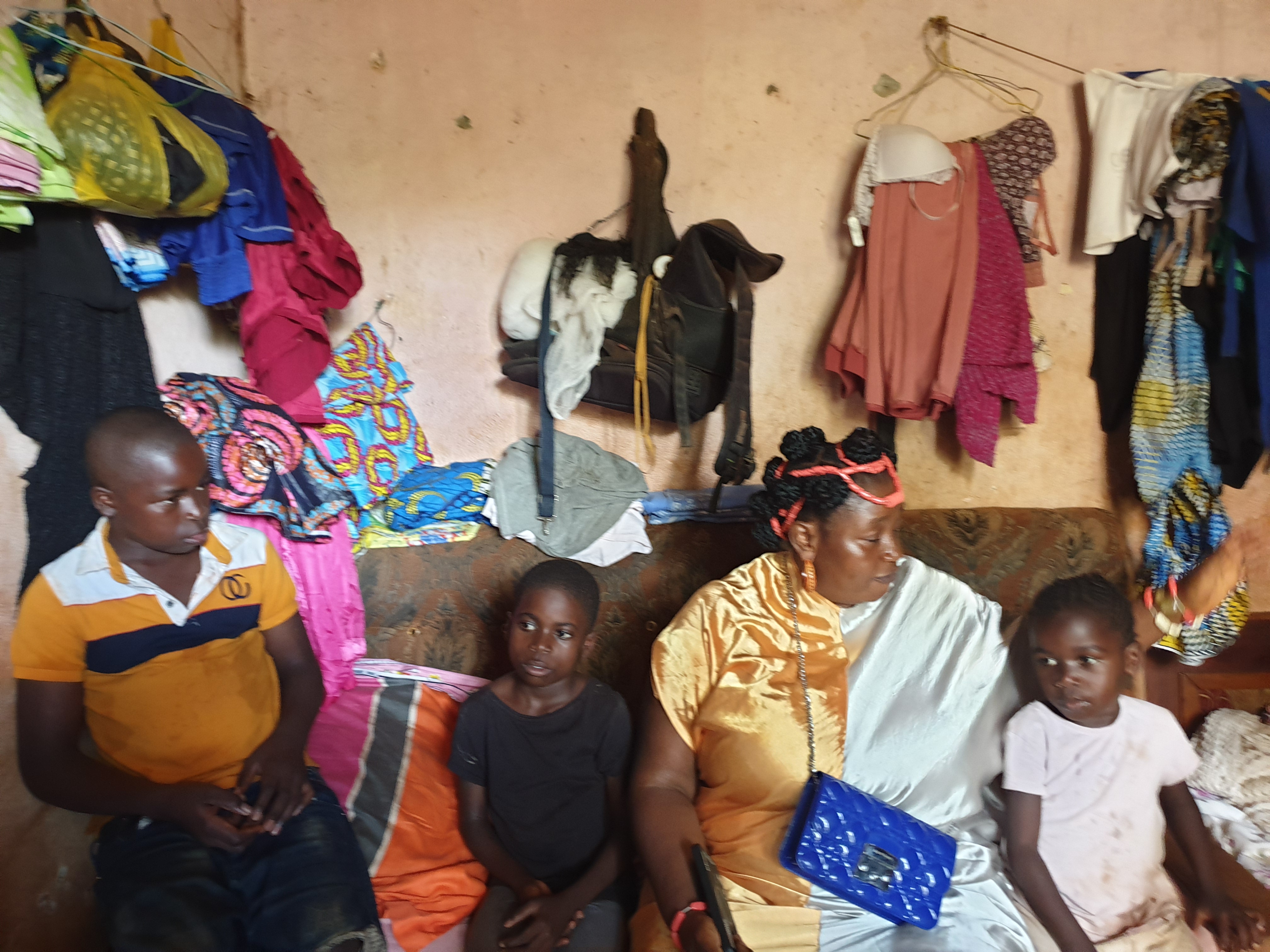 Founder with family during home visit