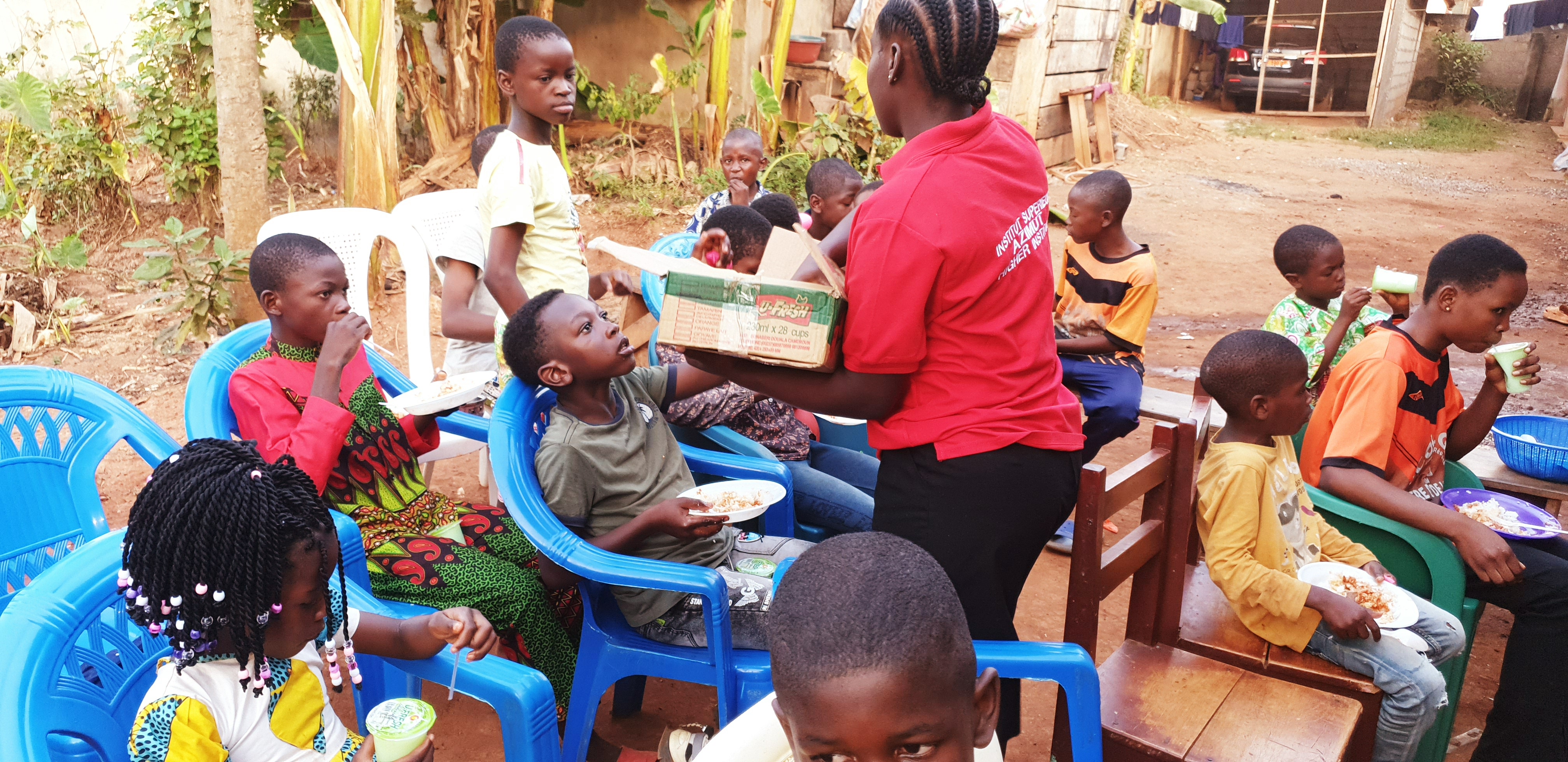 Children receiving juice and food